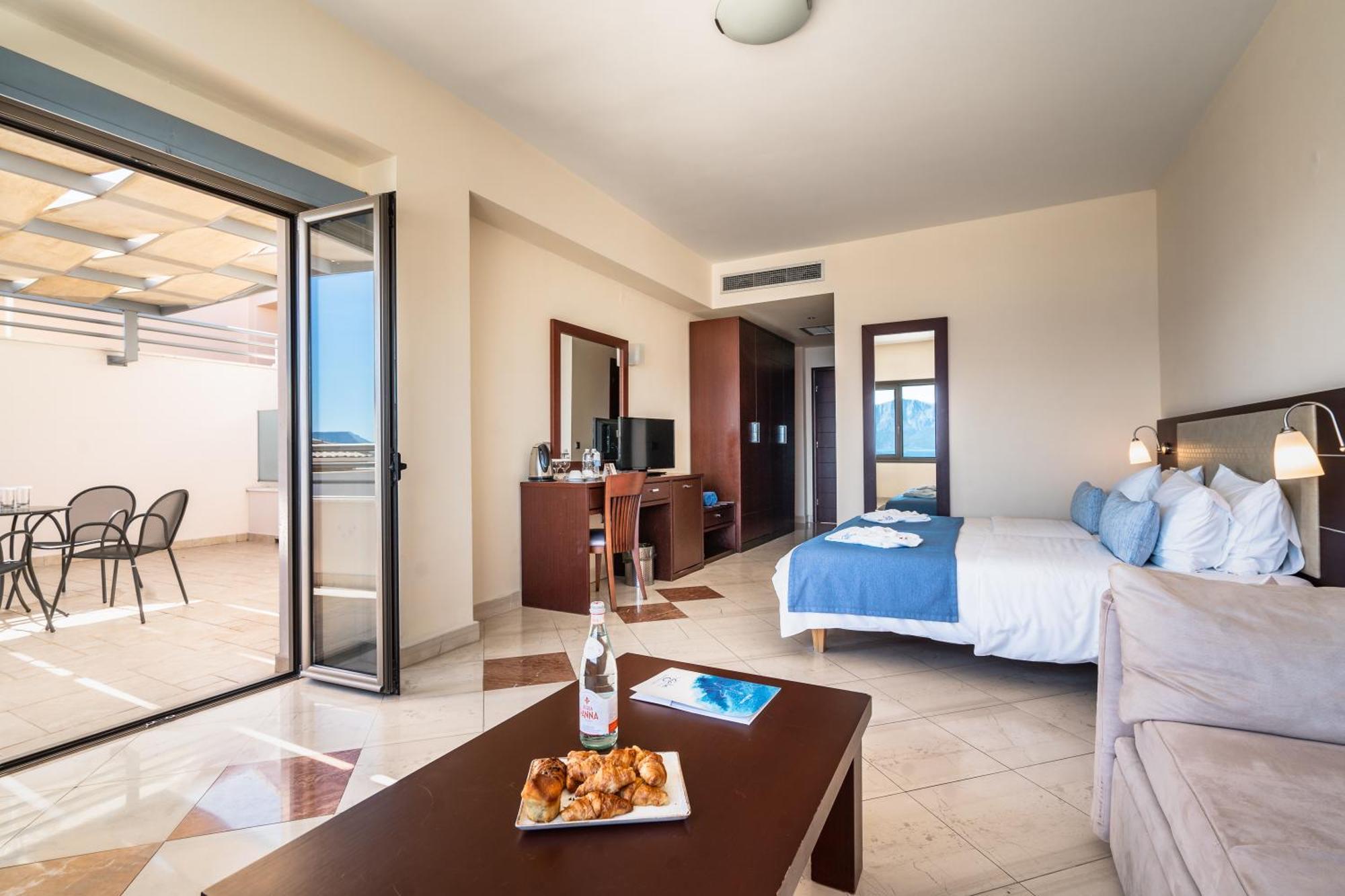Porto Galini Seaside Resort & Spa Nikiana Zewnętrze zdjęcie A typical hotel room