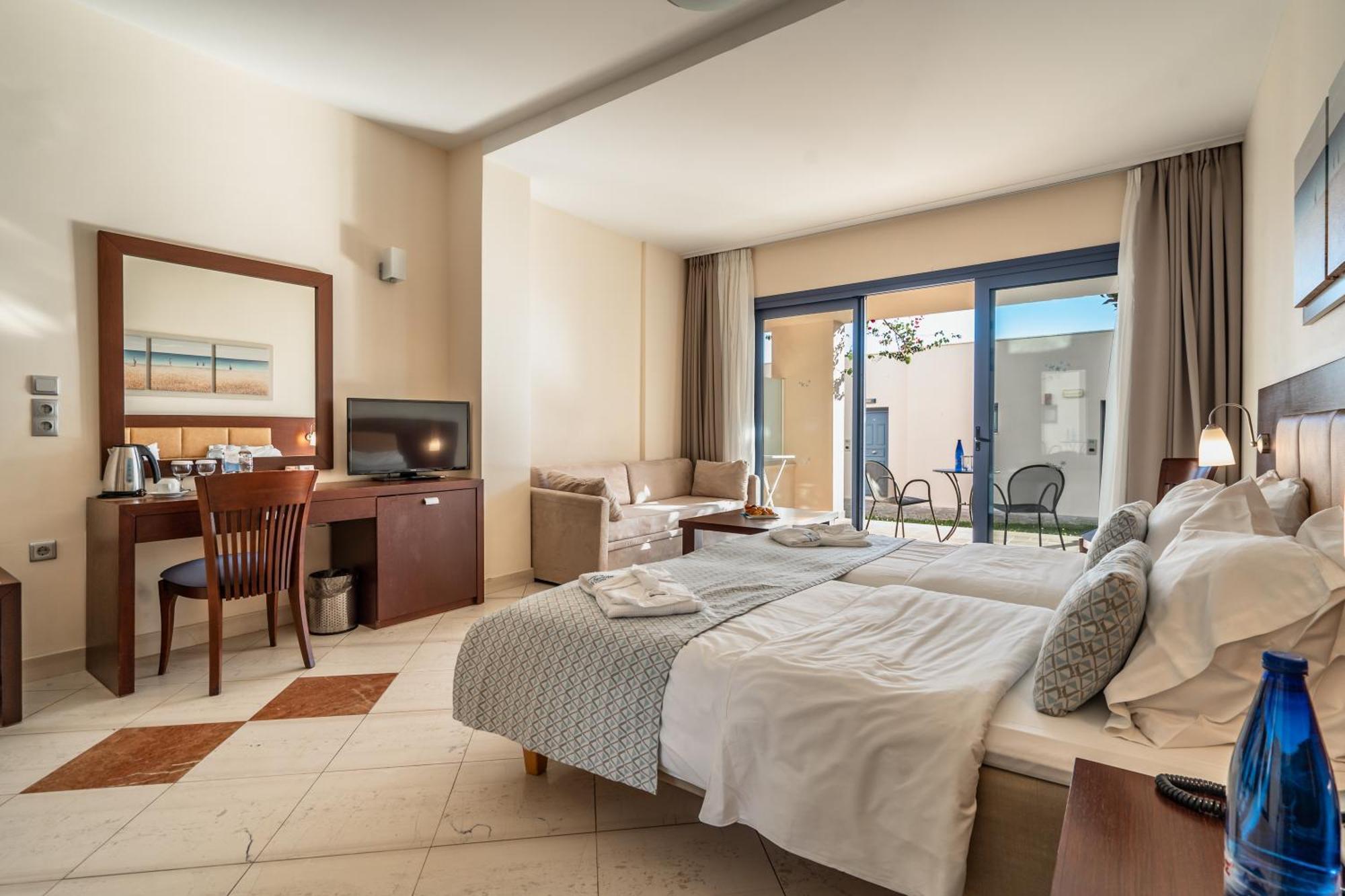 Porto Galini Seaside Resort & Spa Nikiana Zewnętrze zdjęcie A typical hotel room